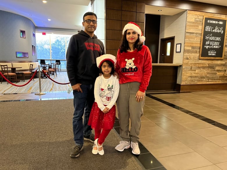 Sharif Rahman, Shayela Nasrin, and their daughter Shaikha. According to her mother, Shaikha says no food she's tasted since her father, a restauranteur, died has tasted good.